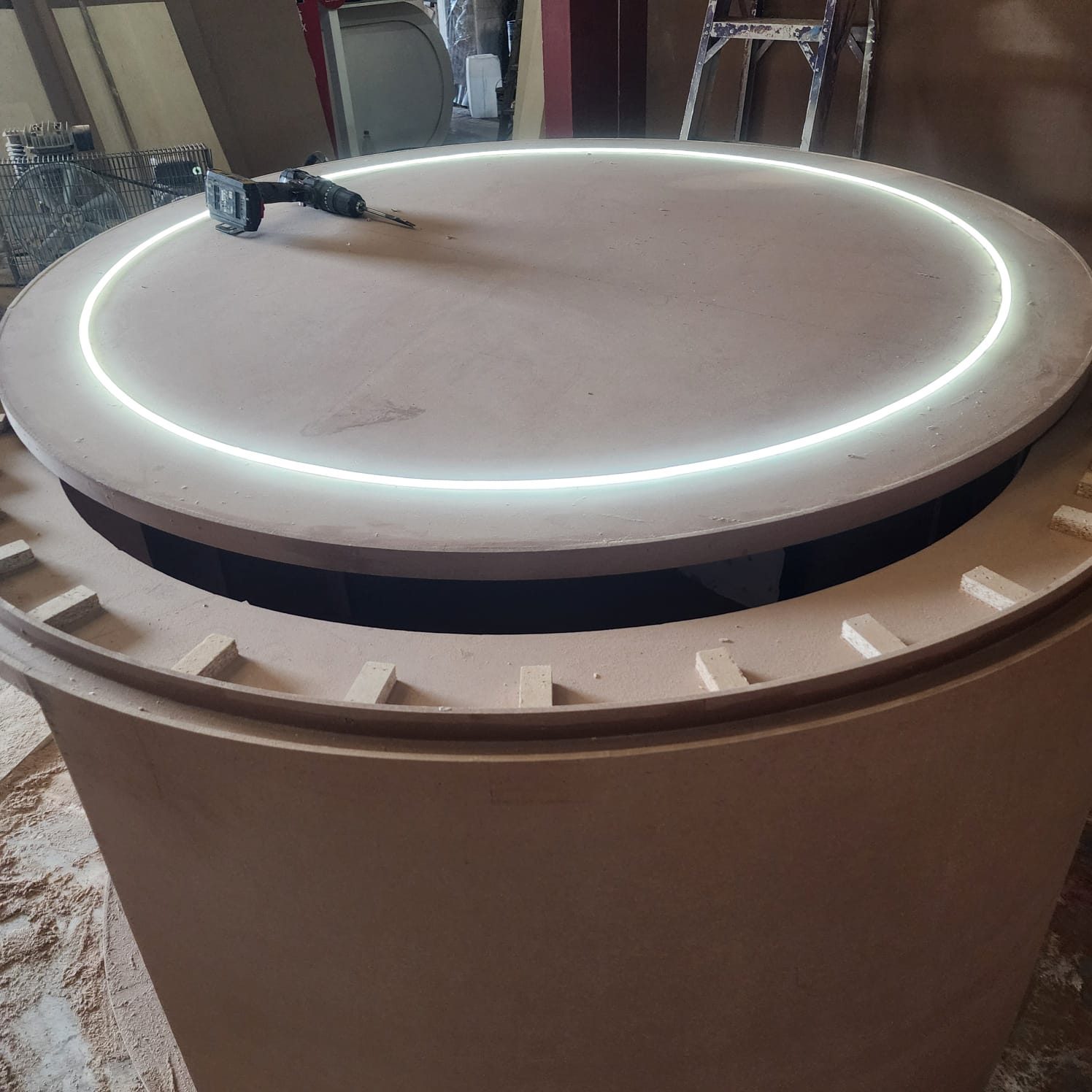 LED-lit circular display plinth being fabricated in the Exhibition 4 All workshop