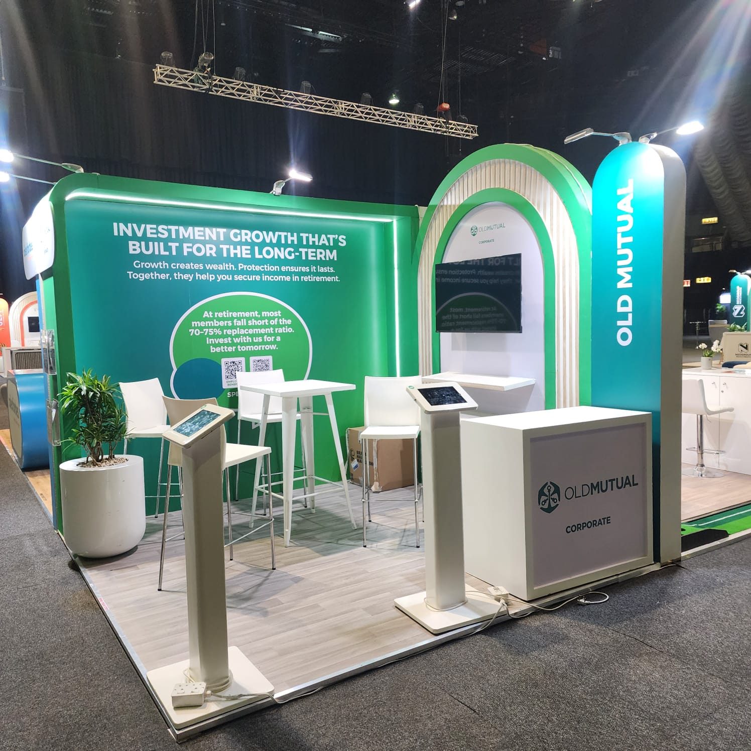 Custom-built exhibition stand with arched branding at a South African trade show