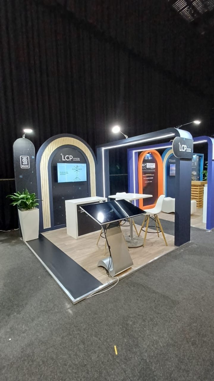 Illuminated mall activation display with arch and touch screens