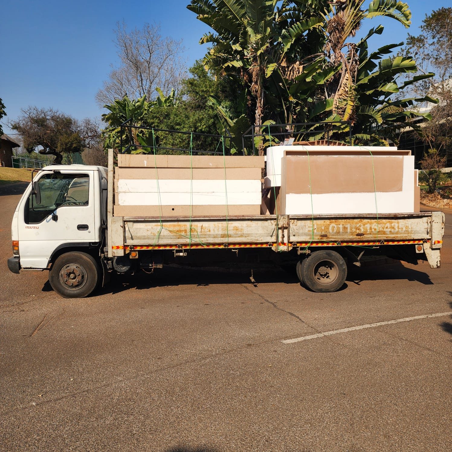 Delivery truck loaded with exhibition stand materials for site install
